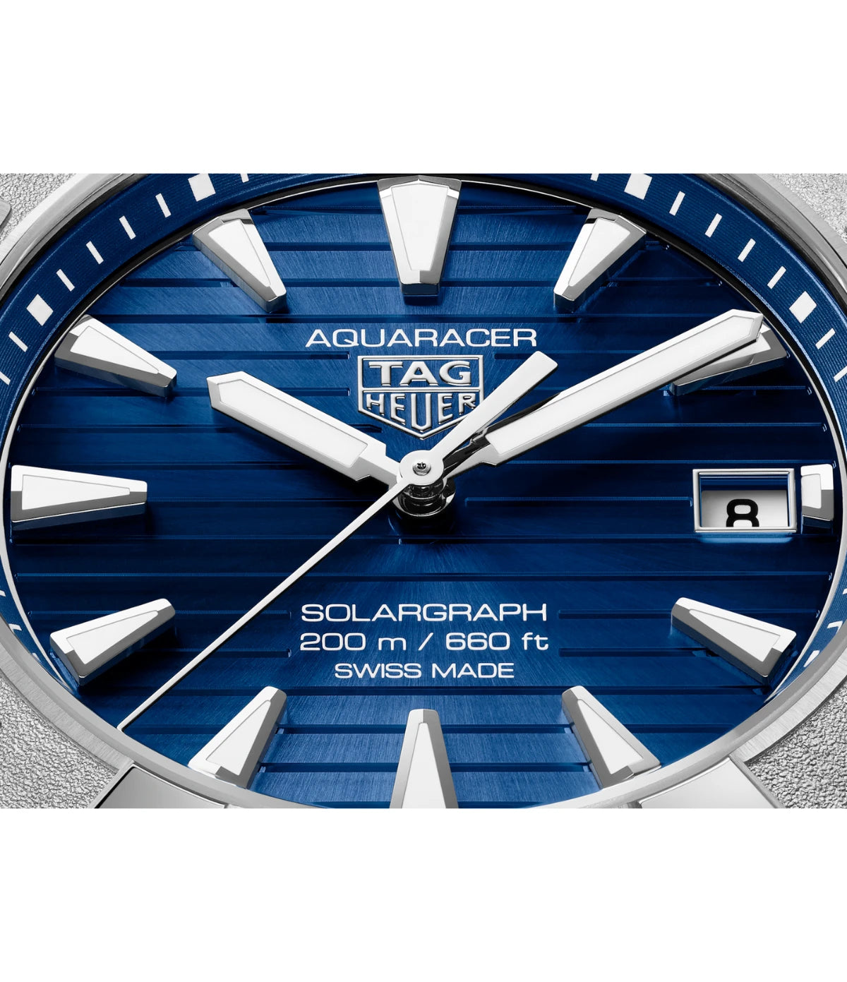 Close-up of the blue sunray brushed dial on the TAG Heuer Aquaracer Professional 200 Solargraph WBP1117.BA0047 showing rhodium-plated indexes with Super-LumiNova