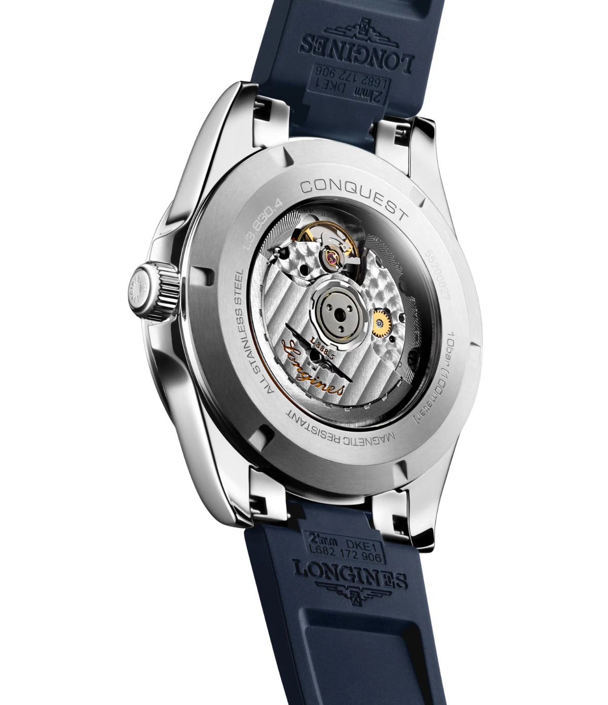 Longines Conquest automatic watch showing the back case with a transparent window revealing the mechanical movement, paired with a dark blue rubber strap on a white background.