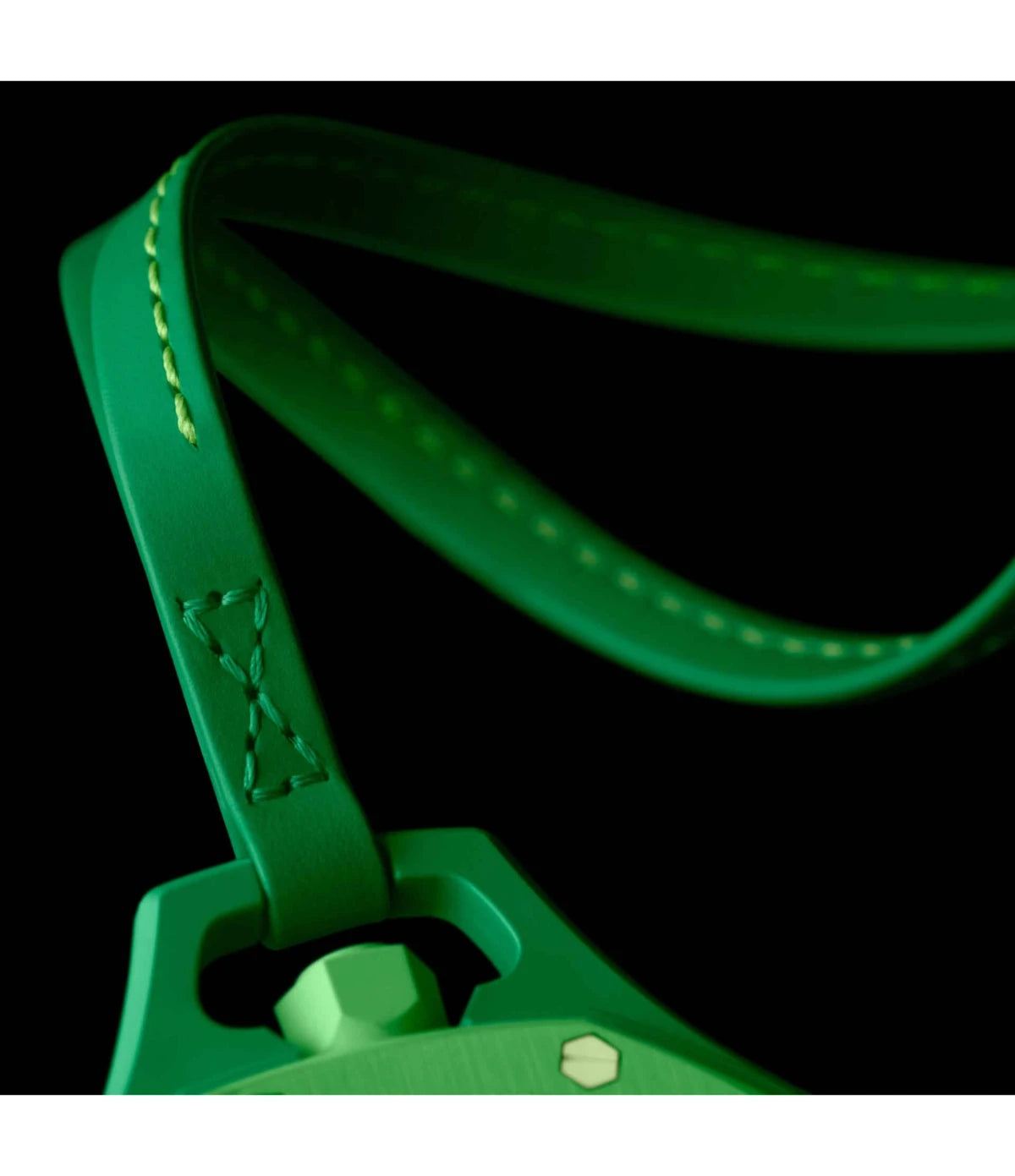 Close-up of the green calfskin lanyard with contrasting light green stitching included with the Swatch x Audemars Piguet Royal Pop Green Eight SSX03G100N