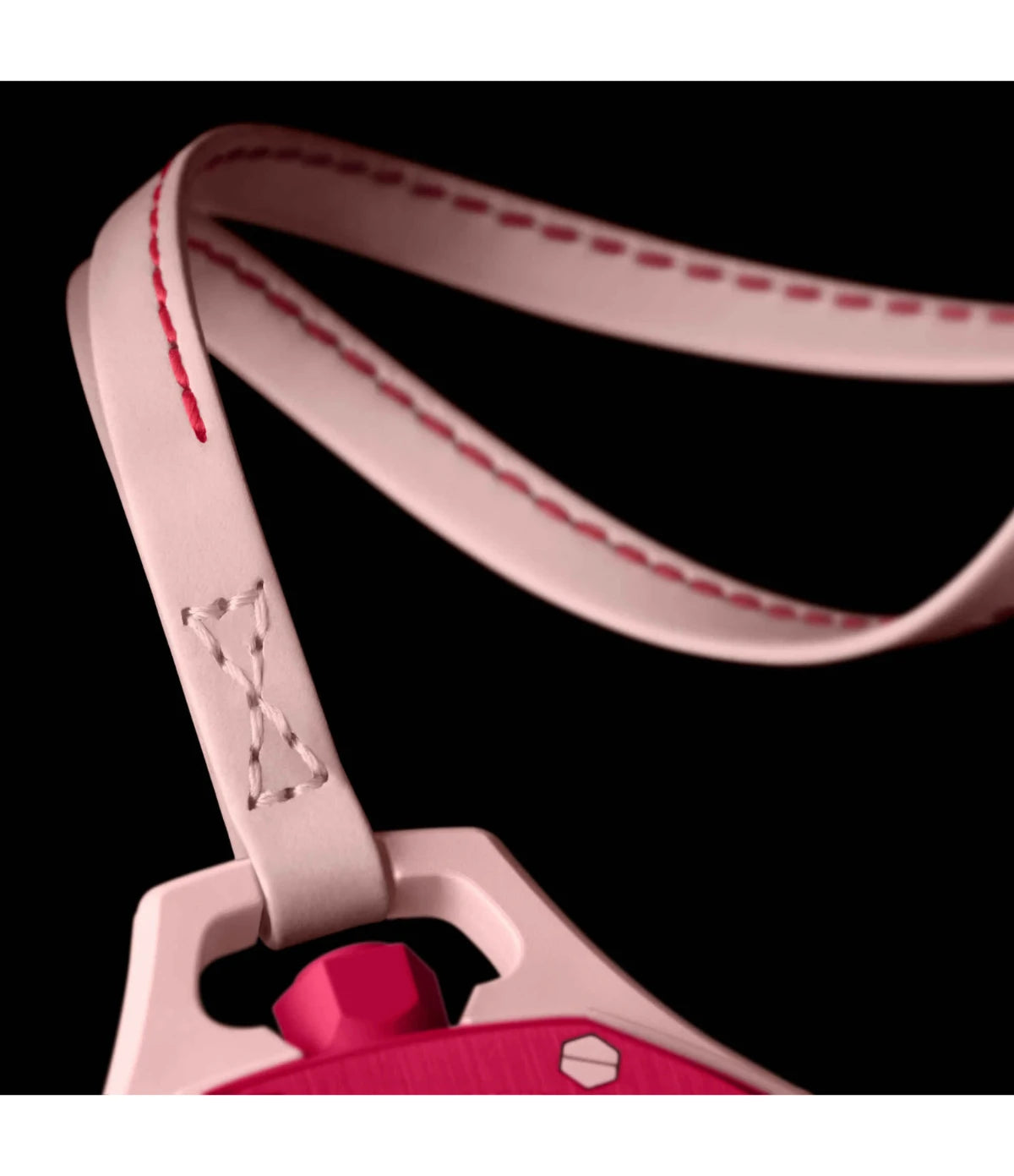 Close-up of the pink calfskin lanyard with contrasting red stitching included with the Swatch x Audemars Piguet Royal Pop Otto Rosso SSX03R100N