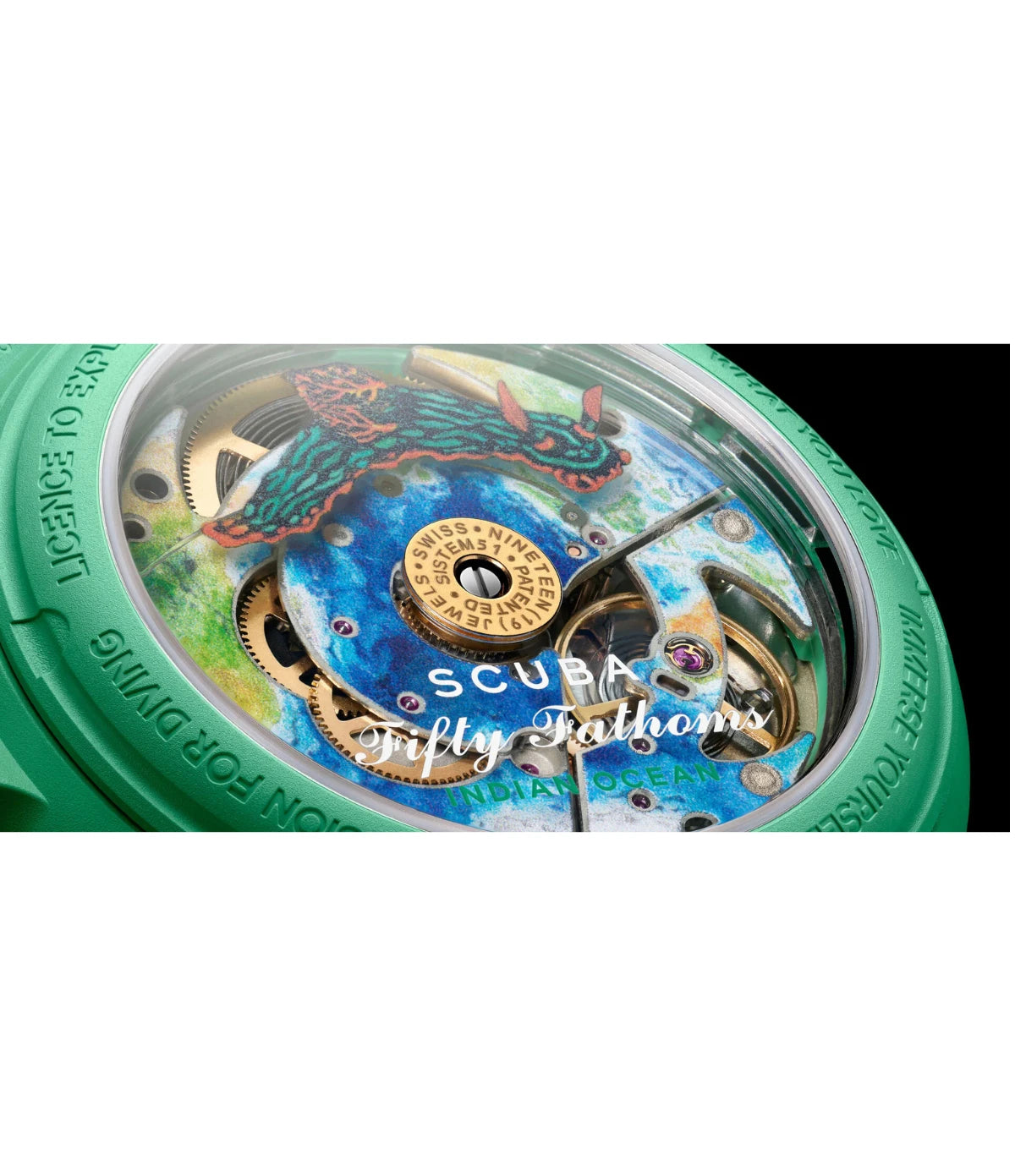 Close-up of the caseback engravings on the Blancpain X Swatch Indian Ocean SO35I100C showing the five inspirational inscriptions and nudibranch illustration
