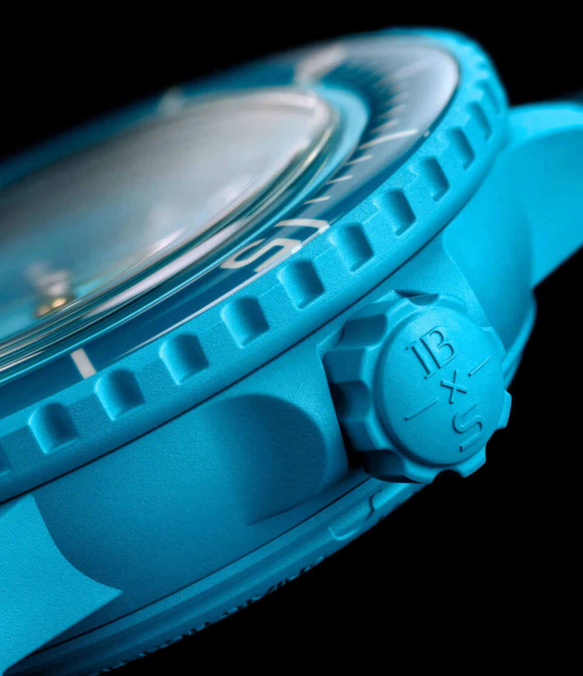 Close-up of engraved crown of the Blancpain X Swatch Blue Lagoon SO35L400