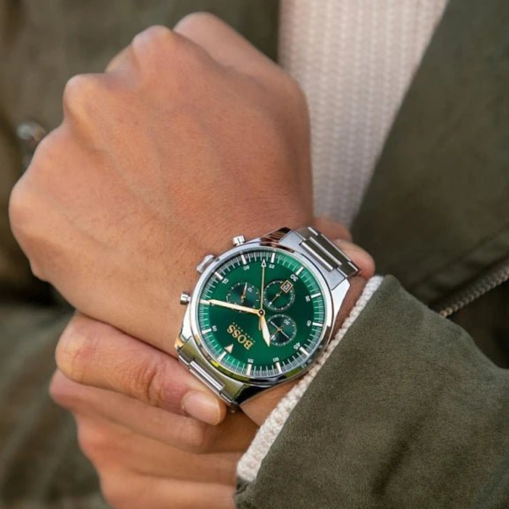 Lifestyle image of the Hugo Boss Pioneer Watch worn with a smart outdoor outfit.