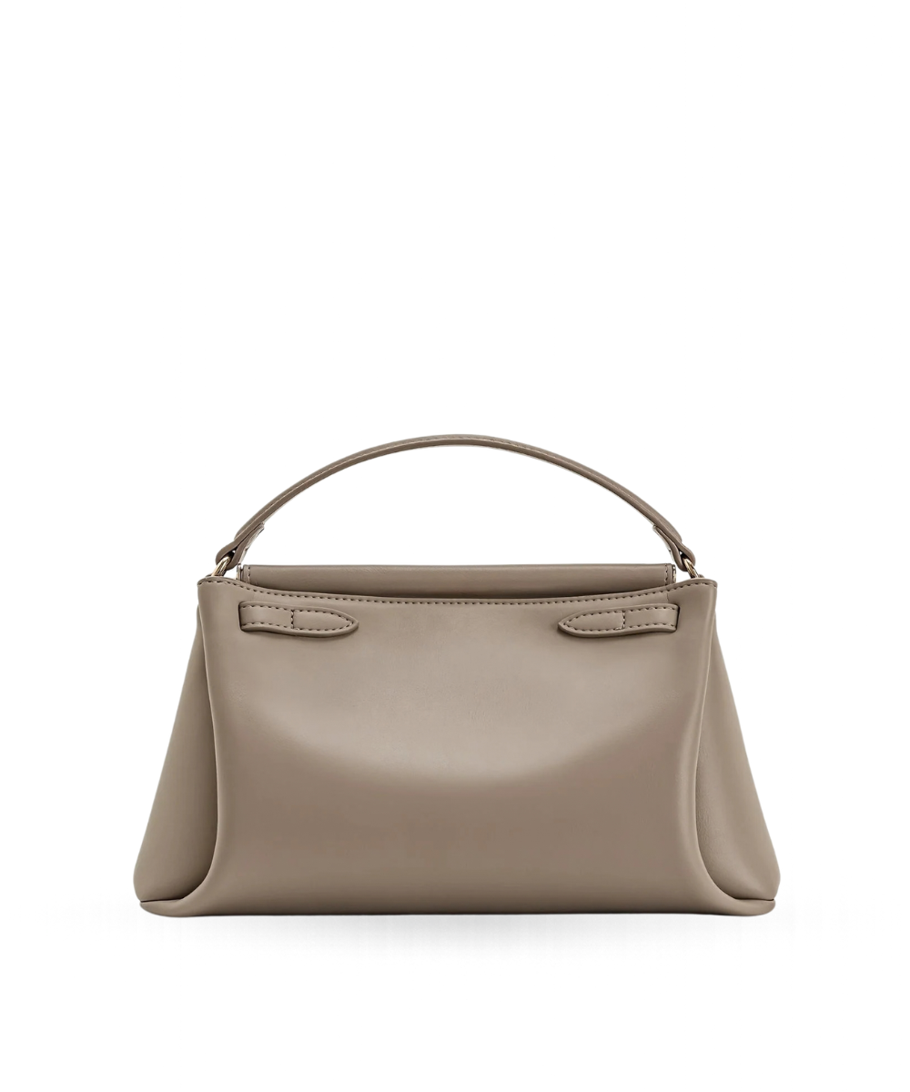 Back profile of the JW PEI Carmen bag in apricot, showing its structured silhouette and strap design