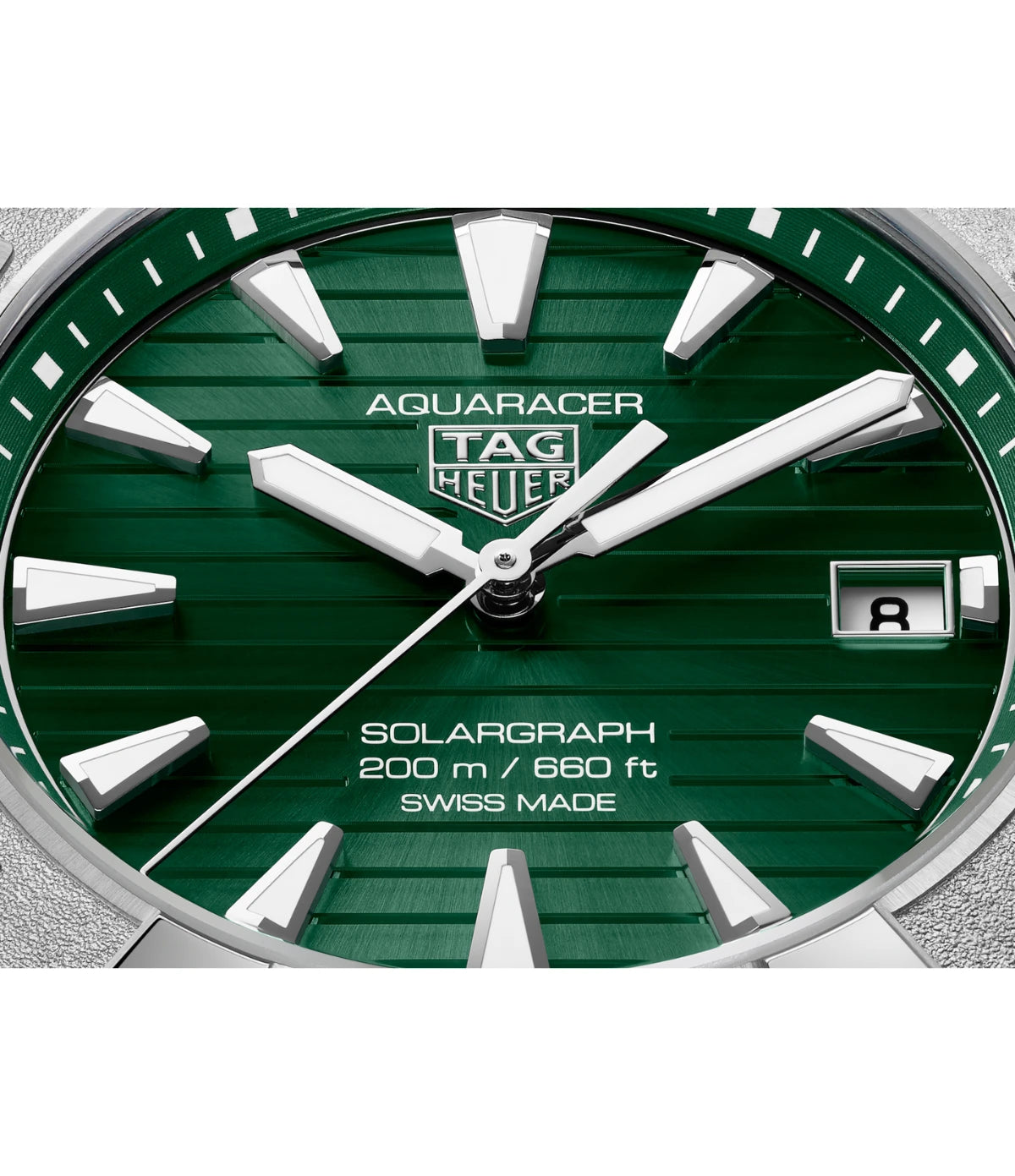 Close-up of the green sunray brushed dial on the TAG Heuer Aquaracer Professional 200 Solargraph WBP1118.BA0047 showing rhodium-plated indexes with Super-LumiNova