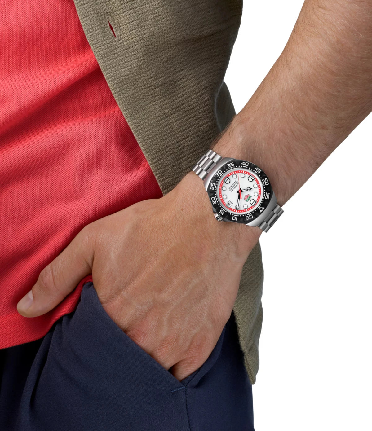 TAG Heuer Formula 1 Solargraph WBY1111.BA0042 worn on the wrist, showing 38mm case proportions and white opalin dial with red flange