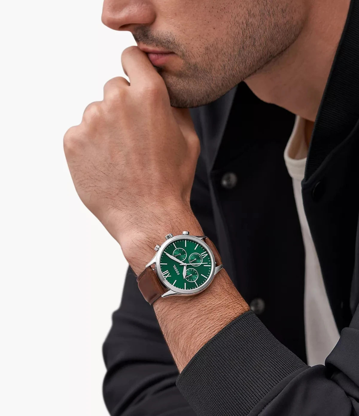 Fossil Fenmore 44mm BQ2813 worn on the wrist, showing the bold case size and green sunray dial