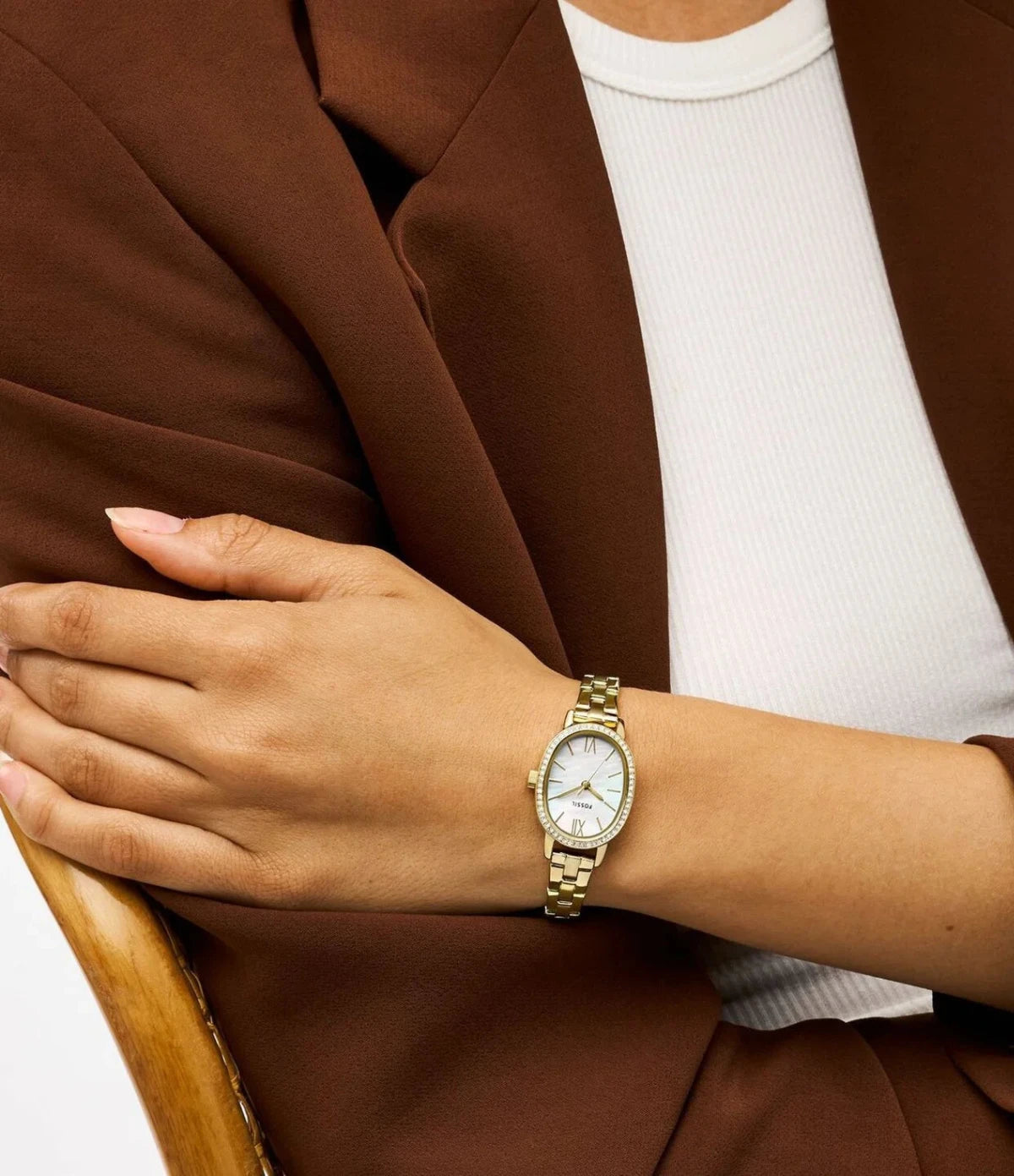 Fossil Penny 23mm BQ3976 worn on the wrist, showing the oval case and white mother-of-pearl dial