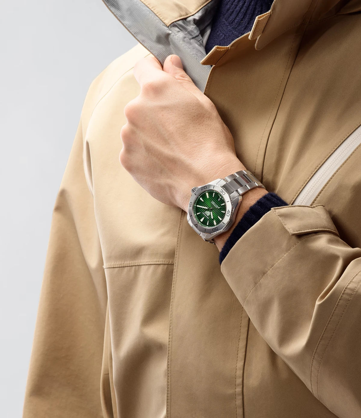 TAG Heuer Aquaracer Professional 200 Date WBP2115.BA0627 worn on the wrist, showing 40mm case proportions and green sunray dial