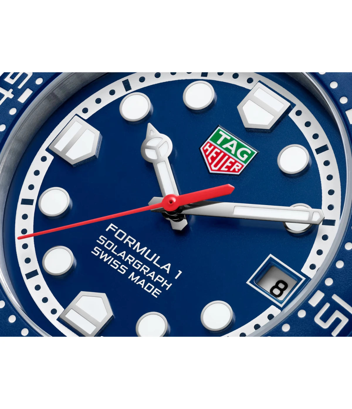 Close-up of the blue opalin dial on the TAG Heuer Formula 1 Solargraph WBY1112.BA0042 showing rhodium-plated hands and Super-LumiNova indexes