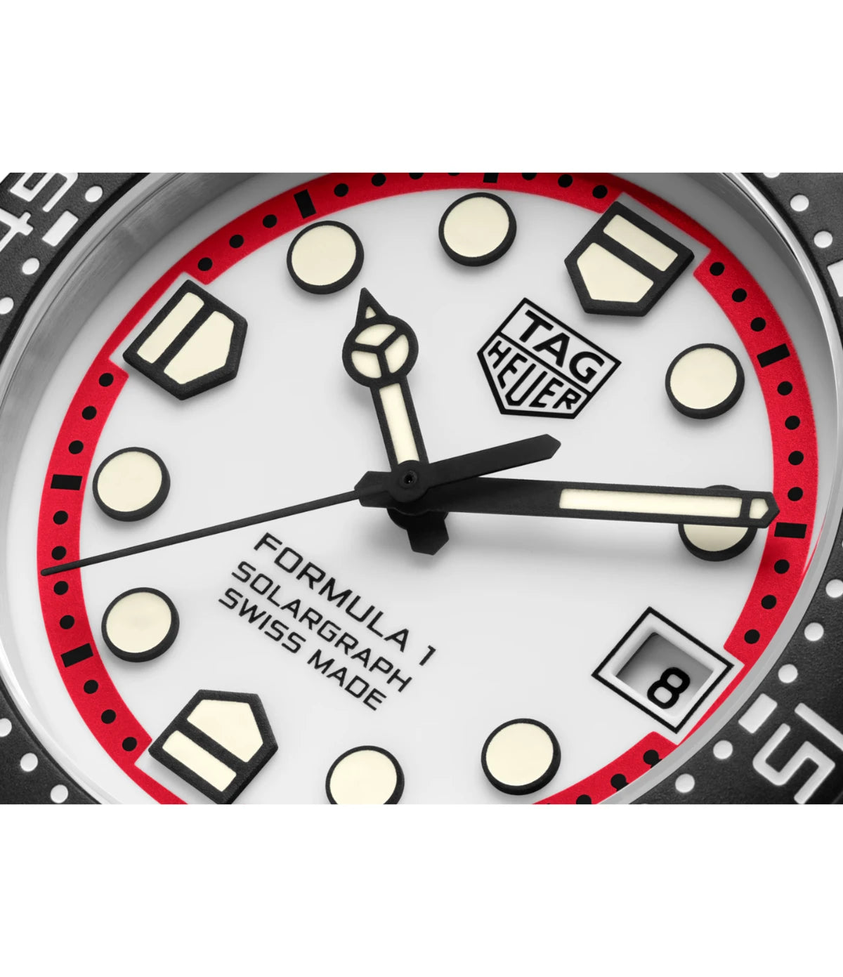 Close-up of the white opalin dial with red flange on the TAG Heuer Formula 1 Solargraph WBY1161.FT8086 showing black lacquered hands with eggshell Super-LumiNova