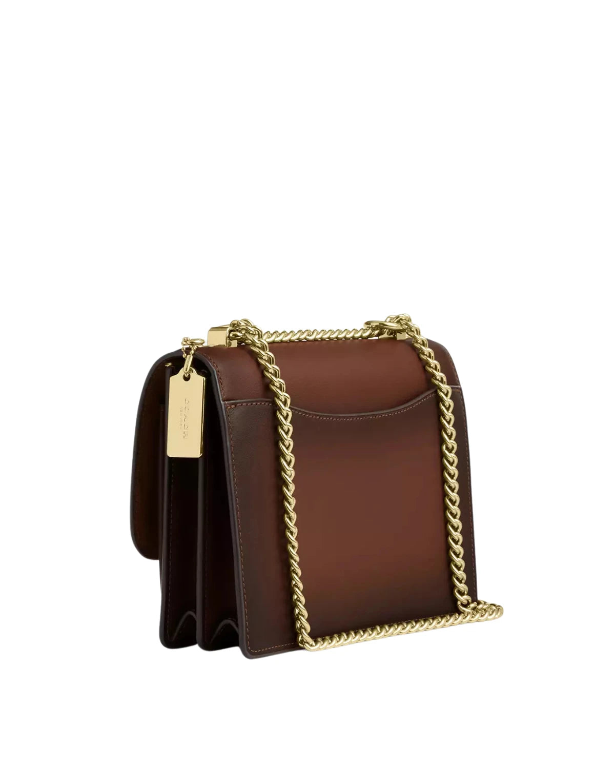 Side profile of the Coach Klare Crossbody Bag CDY35 showing burnished smooth leather texture and adjustable strap