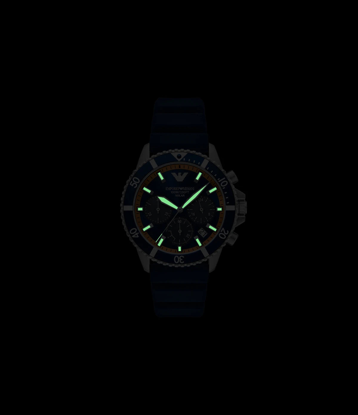 AR11696 Emporio Armani World Explorer Solar-Powered Chronograph Watch placed in a dark room, to showcase the luminous glow hands