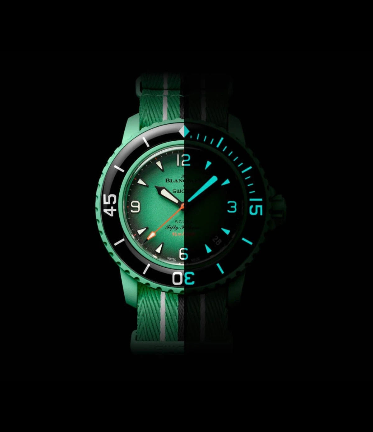 Blancpain X Swatch Indian Ocean SO35I100C dial glowing in the dark, showing Grade A Super-LumiNova on hour markers, hands and bezel scale