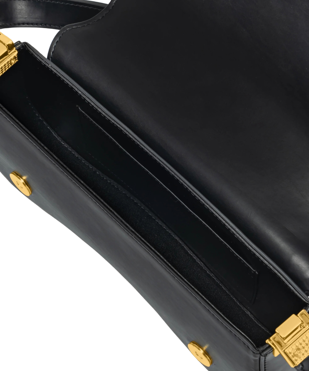 Interior view of the JW PEI Joy bag in black, showing the lining and 1 interior pocket