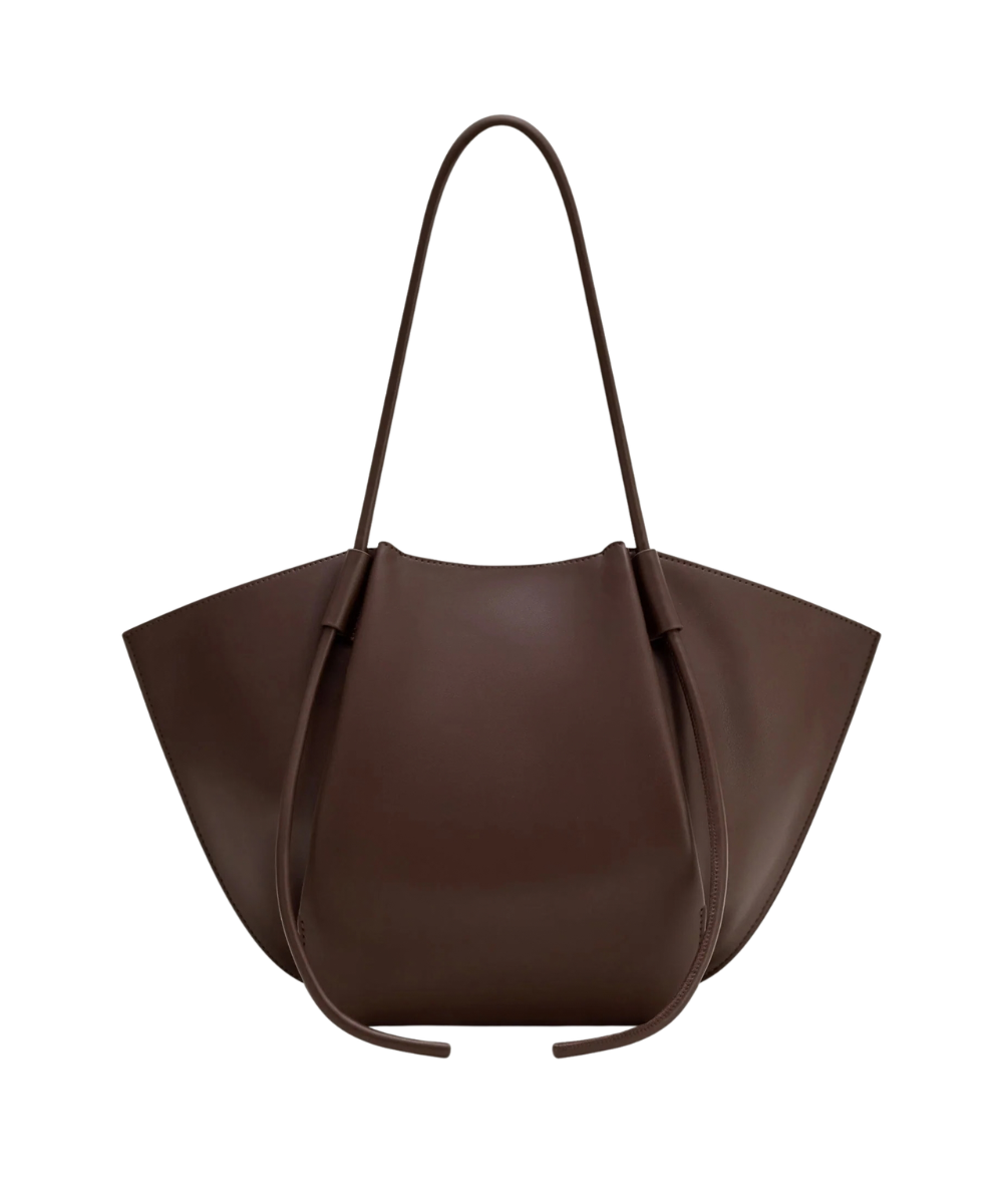 Back profile of the JW PEI Nala bag in deep brown, showing its structured silhouette and strap design