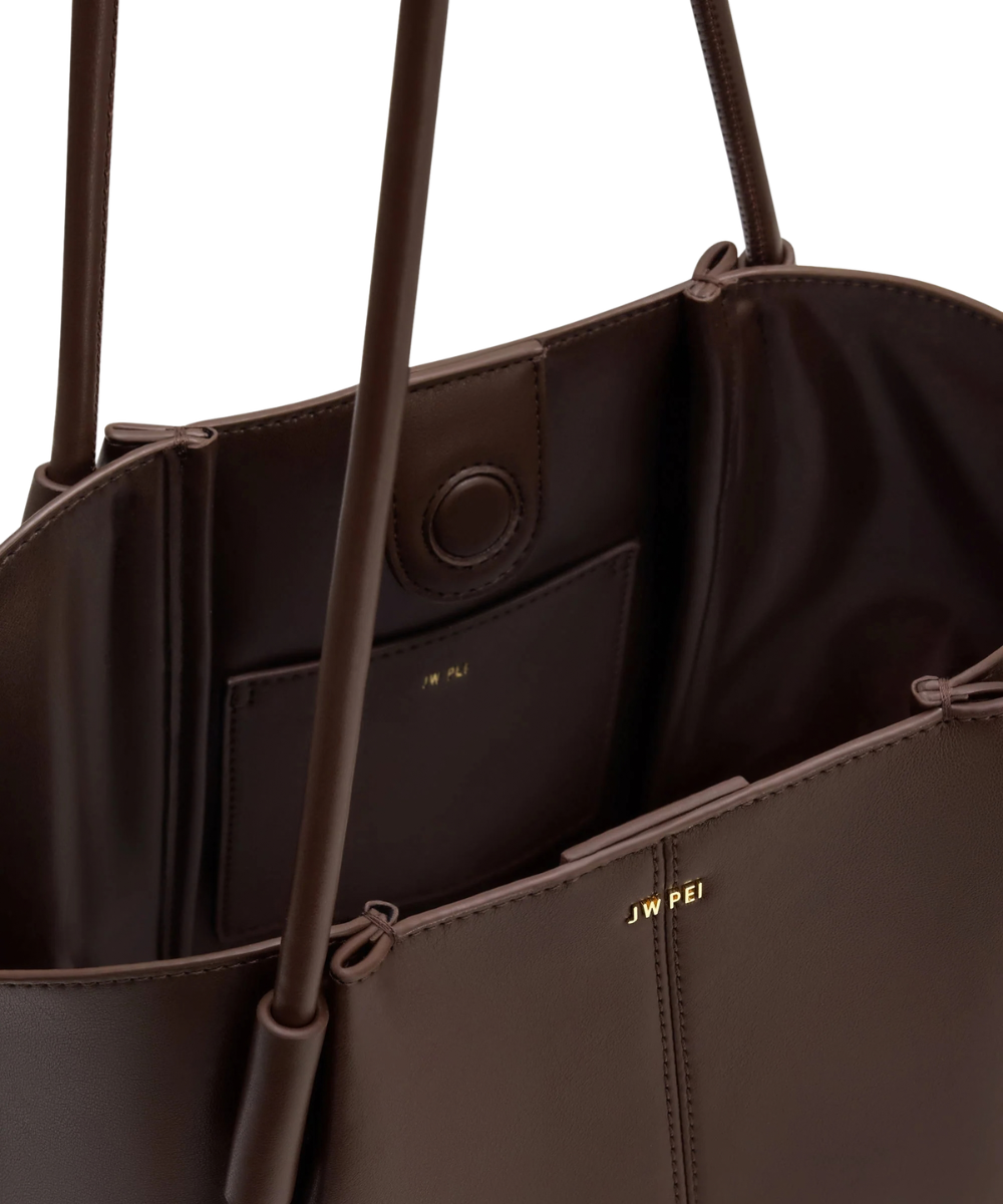 Interior view of the JW PEI Nala bag in deep brown, showing the lining and 1 interior slip pocket