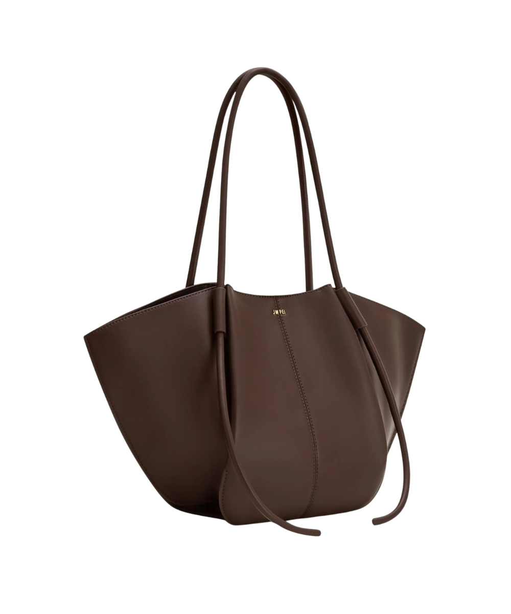 Side profile of the JW PEI Nala bag in deep brown, showing its structured silhouette and strap design