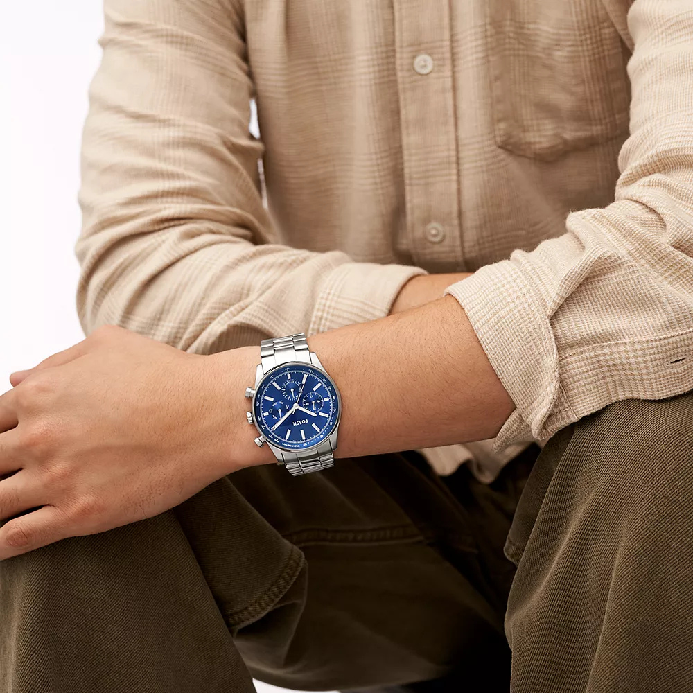 Lifestyle image of the Sullivan Watch styled with a smart casual outfit.