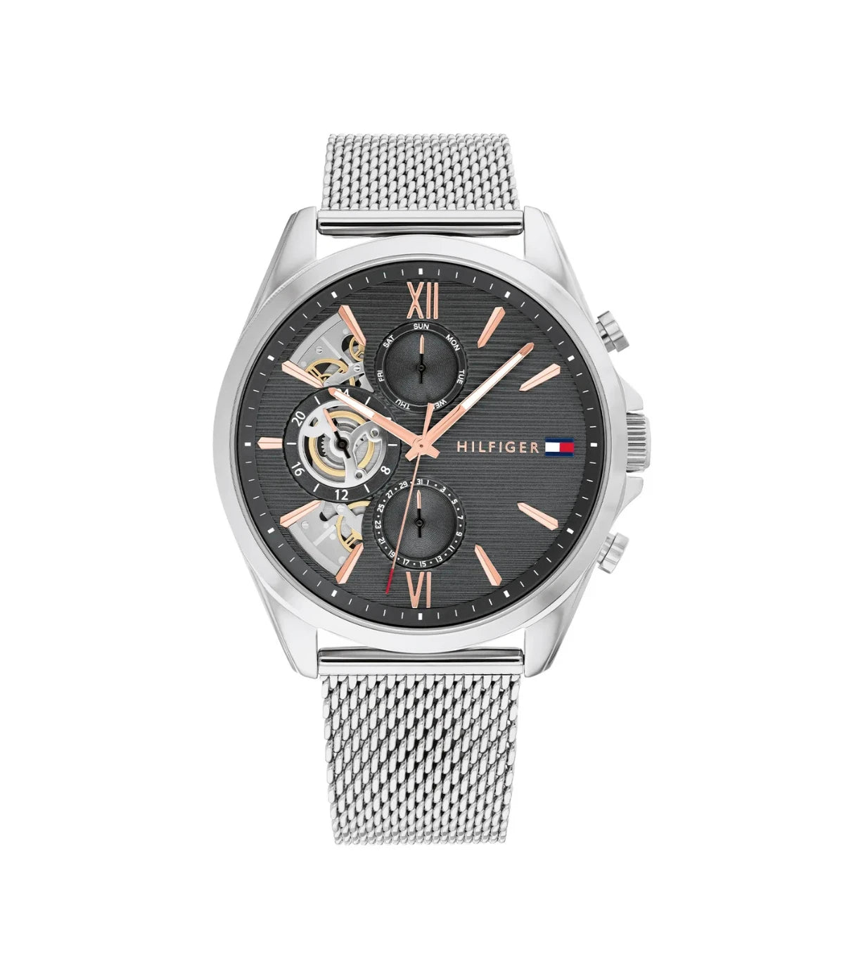 1710646 Tommy Hilfiger Baker Men's Multifunction Silver Mesh Watch front dial view with open-heart black dial, rose gold Roman numerals, and day date sub-dials at Time Vault